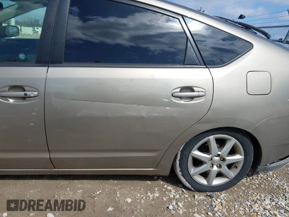 2009 Toyota Prius with VIN JTDKB20U597836506, listed as a IAAI auction lot 41869466 with 189,016 mi miles and . Bid and sale history available at DreamBid. Image 14.