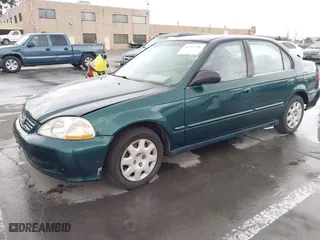1999 Honda Civic VP with VIN 2HGEJ6618XH579736, listed as a IAAI auction lot 41912296 with 268,631 mi miles. Bid and sale history available at carsss.com. Image 18.