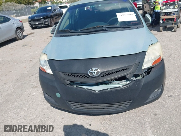 2008 Toyota Yaris with VIN JTDBT923384015057, listed as a IAAI auction lot 41879099 with 184,995 mi miles. Bid and sale history available at carsss.com. Image 13.