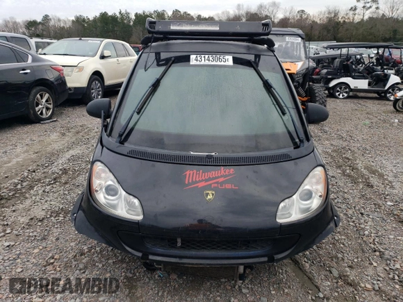 2012 Smart fortwo Pure z VIN WMEEJ3BA6CK567723, wystawiony jako Copart lot #43143065 z przebiegiem Nie podano mil oraz Szkody całkowita. Historia ofert i sprzedaży dostępna na DreamBid. Obrazek 5.