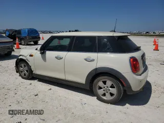 2017 MINI Hardtop 4 Door Cooper z VIN WMWXU1C59H2E18282, wystawiony jako Copart lot #51451895 z przebiegiem 118 919 mil mil oraz Szkoda całkowita • Salvage title. Historia ofert i sprzedaży dostępna na DreamBid. Obrazek 2.