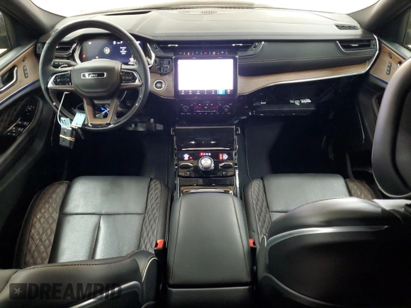 2023 Jeep Grand Cherokee Summit Reserve with VIN 1C4RJKEG3P8862582, listed as a Copart auction lot 54504345 with 9,763 mi miles and Salvage title. Bid and sale history available at DreamBid. Image 8.