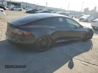 2014 Tesla Model S 60 с VIN 5YJSA1H16EFP40654, выставлен на аукционе Copart как лот 72070974 с пробегом Не указан миль и Списание • Salvage title. История ставок и продаж доступна на DreamBid. Изображение 3.