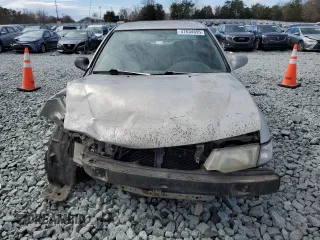 1999 Nissan Sentra XE with VIN 1N4AB41D6XC717640, listed as a Copart auction lot 47634695 with 286,038 mi miles and Salvage title. Bid and sale history available at DreamBid. Image 5.