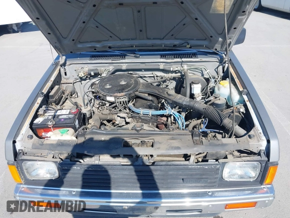 1988 Nissan Hardbody z VIN 1N6ND11S0JC345025, wystawiony jako IAAI lot #41899460 z przebiegiem 132 502 mil mil oraz . Historia ofert i sprzedaży dostępna na DreamBid. Obrazek 10.