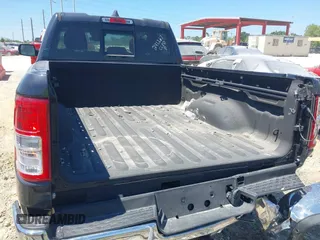 2021 Ram 1500 Lone Star z VIN 1C6RREBT0MN630263, wystawiony jako IAAI lot #41887871 z przebiegiem 52 386 mil mil oraz . Historia ofert i sprzedaży dostępna na DreamBid. Obrazek 16.