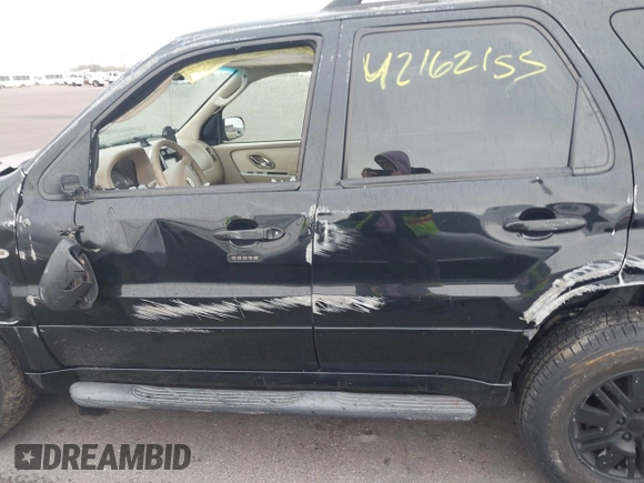 2005 Mercury Mariner Luxury z VIN 4M2CU57115DJ33938, wystawiony jako IAAI lot #42162155 z przebiegiem 174 834 mil mil oraz . Historia ofert i sprzedaży dostępna na DreamBid. Obrazek 14.