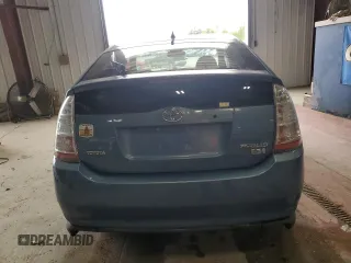 2006 Toyota Prius z VIN JTDKB20U563146130, wystawiony jako Copart lot #58481625 z przebiegiem Nie podano mil oraz Czysty tytuł • Clean title. Historia ofert i sprzedaży dostępna na DreamBid. Obrazek 6.