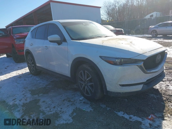 2017 Mazda CX-5 Grand Touring with VIN JM3KFBDL2H0171021, listed as a IAAI auction lot 41619642 with 67,581 mi miles. Bid and sale history available at carsss.com. Image 1.