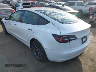 2022 Tesla Model 3 with VIN 5YJ3E1EA8NF210196, listed as a IAAI auction lot 41674407 with 24,270 mi miles. Bid and sale history available at carsss.com. Image 3.
