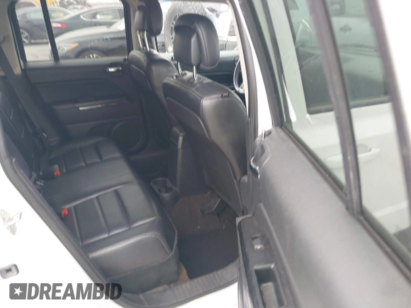 2014 Jeep Patriot Limited with VIN 1C4NJPCB2ED694389, listed as a IAAI auction lot 42028445 with 128,343 mi miles and . Bid and sale history available at DreamBid. Image 8.