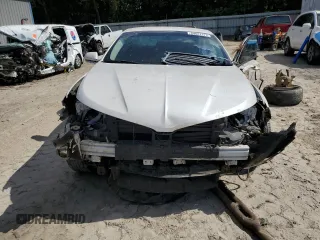 2013 Lincoln MKZ z VIN 3LN6L2GK2DR823745, wystawiony jako Copart lot #54887275 z przebiegiem 163 267 mil mil oraz Szkoda całkowita • Salvage title. Historia ofert i sprzedaży dostępna na DreamBid. Obrazek 5.