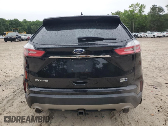 2019 Ford Edge SEL z VIN 2FMPK4J9XKBB10418, wystawiony jako Copart lot #58368335 z przebiegiem 97 458 mil mil oraz Czysty tytuł • Clean title. Historia ofert i sprzedaży dostępna na DreamBid. Obrazek 6.