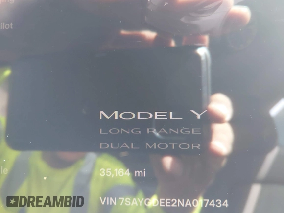 2022 Tesla Model Y Long Range with VIN 7SAYGDEE2NA017434, listed as a IAAI auction lot 41842025 with 35,164 mi miles and . Bid and sale history available at DreamBid. Image 7.