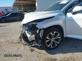 2020 Lexus RX with VIN 2T2HGMDAXLC044439, listed as a IAAI auction lot 41277340 with 62,688 mi miles. Bid and sale history available at carsss.com. Image 6.