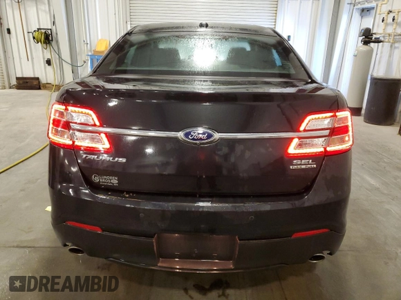 2014 Ford Taurus SEL z VIN 1FAHP2E82EG186640, wystawiony jako Copart lot #55820205 z przebiegiem 194 843 mil mil oraz Czysty tytuł • Clean title. Historia ofert i sprzedaży dostępna na DreamBid. Obrazek 6.