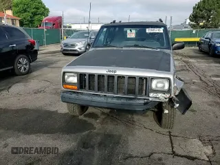 2000 Jeep Cherokee with VIN 1J4FF48S5YL172583, listed as a Copart auction lot 59605745 with 258,409 mi miles and Salvage title. Bid and sale history available at DreamBid. Image 13.