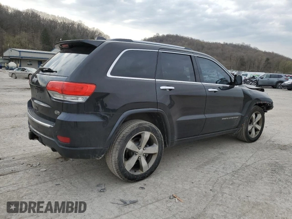 2014 Jeep Grand Cherokee Overland with VIN 1C4RJFCG5EC373508, listed as a Copart auction lot 52645295 with 166,474 mi miles and Salvage Title. Bid and sale history available at carsss.com. Image 3.