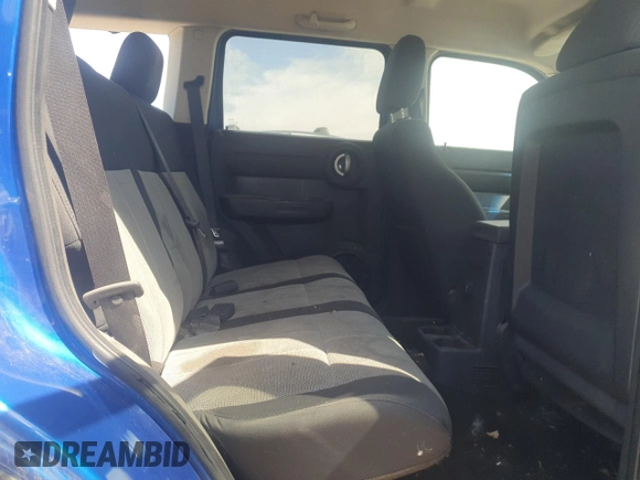 2008 Dodge Nitro SXT z VIN 1D8GU28K18W137902, wystawiony jako Copart lot #54234025 z przebiegiem 198 605 mil mil oraz Czysty tytuł • Clean title. Historia ofert i sprzedaży dostępna na DreamBid. Obrazek 10.