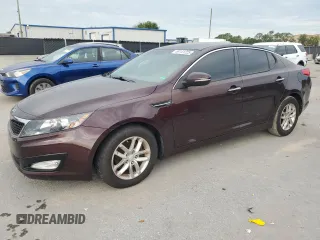 2013 Kia Optima LX z VIN 5XXGM4A77DG241452, wystawiony jako Copart lot #59141225 z przebiegiem 118 761 mil mil oraz Szkoda całkowita • Salvage title. Historia ofert i sprzedaży dostępna na DreamBid. Obrazek 1.