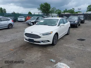 2017 Ford Fusion Titanium with VIN 3FA6P0K96HR115561, listed as a IAAI auction lot 42596030 with 187,865 mi miles and . Bid and sale history available at DreamBid. Image 18.