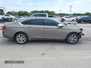 2017 Chevrolet Impala with VIN 1G1105S37HU143971, listed as a IAAI auction lot 42091671 with 137,310 mi miles and . Bid and sale history available at DreamBid. Image 14.