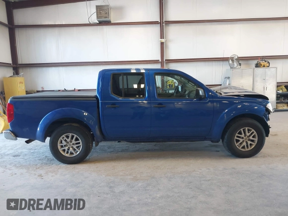 2014 Nissan Frontier SV with VIN 1N6AD0ER0EN766382, listed as a IAAI auction lot 41687781 with 143,804 mi miles and . Bid and sale history available at DreamBid. Image 13.