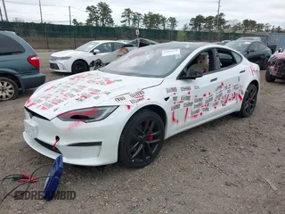 2023 Tesla Model S Plaid with VIN 5YJSA1E68PF507197, listed as a IAAI auction lot 42062258 with Not provided miles and . Bid and sale history available at DreamBid. Image 23.