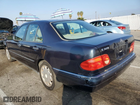 1997 Mercedes-Benz E 320 with VIN WDBJF55FXVA430115, listed as a Copart auction lot 43053715 with 158,057 mi miles and Clean Title. Bid and sale history available at DreamBid. Image 2.