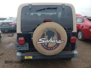 2000 Jeep Wrangler Sahara z VIN 1J4FA59S2YP714136, wystawiony jako Copart lot #57635845 z przebiegiem 178 075 mil mil oraz Czysty tytuł • Clean title. Historia ofert i sprzedaży dostępna na DreamBid. Obrazek 6.