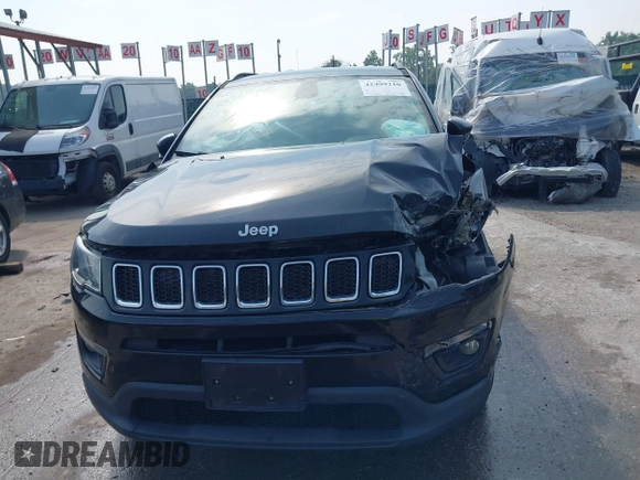 2018 Jeep Compass Latitude with VIN 3C4NJDBB2JT114644, listed as a IAAI auction lot 42499210 with 82,988 mi miles and . Bid and sale history available at DreamBid. Image 13.