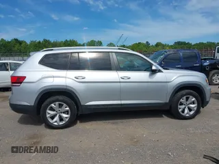 2018 Volkswagen Atlas SE z VIN 1V2DR2CAXJC521412, wystawiony jako IAAI lot #42309661 z przebiegiem 99 045 mil mil oraz . Historia ofert i sprzedaży dostępna na DreamBid. Obrazek 13.
