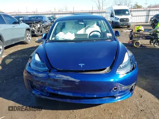 2023 Tesla Model 3 Long Range with VIN 5YJ3E1EB5PF623706, listed as a IAAI auction lot 41321269 with 21,081 mi miles and . Bid and sale history available at DreamBid. Image 12.