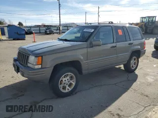 1997 Jeep Grand Cherokee Limited with VIN 1J4GZ78Y4VC754624, listed as a Copart auction lot 49884435 with 144,682 mi miles and Salvage Title. Bid and sale history available at carsss.com. Image 1.