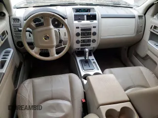 2009 Mercury Mariner Premier z VIN 4M2CU87739KJ21572, wystawiony jako Copart lot #83665504 z przebiegiem 181 858 mil mil oraz Szkoda całkowita • Salvage title. Historia ofert i sprzedaży dostępna na DreamBid. Obrazek 8.