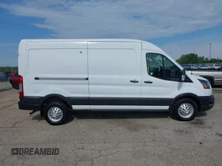2023 Ford Transit z VIN 1FTBW9CG7PKB84159, wystawiony jako IAAI lot #42772115 z przebiegiem 6 945 mil mil oraz . Historia ofert i sprzedaży dostępna na DreamBid. Obrazek 13.