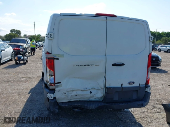 2015 Ford Transit Cargo with VIN 1FTNE1ZM0FKA90248, listed as a IAAI auction lot 41995824 with 157,085 mi miles. Bid and sale history available at carsss.com. Image 6.