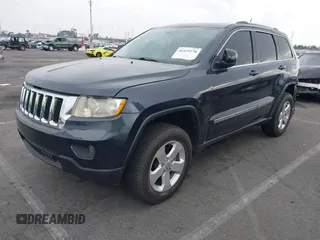 2013 Jeep Grand Cherokee Laredo with VIN 1C4RJEAGXDC620968, listed as a IAAI auction lot 41425270 with 127,739 mi miles. Bid and sale history available at carsss.com. Image 17.