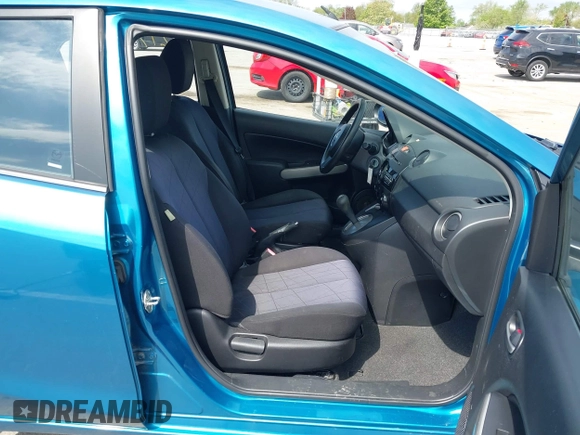 2012 Mazda 2 Sport z VIN JM1DE1KY5C0149990, wystawiony jako IAAI lot #42177069 z przebiegiem 85 371 mil mil oraz . Historia ofert i sprzedaży dostępna na DreamBid. Obrazek 5.