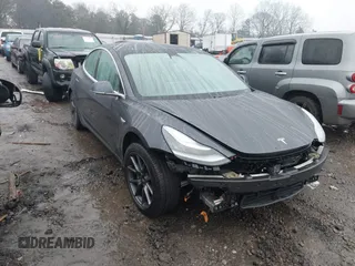 2020 Tesla Model 3 Long Range z VIN 5YJ3E1EBXLF770064, wystawiony jako IAAI lot #41424909 z przebiegiem 96 972 mil mil oraz . Historia ofert i sprzedaży dostępna na DreamBid. Obrazek 1.