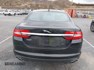 2013 Jaguar XF I4 RWD with VIN SAJWA0ES0DPS64027, listed as a IAAI auction lot 41569121 with 103,115 mi miles. Bid and sale history available at carsss.com. Image 16.