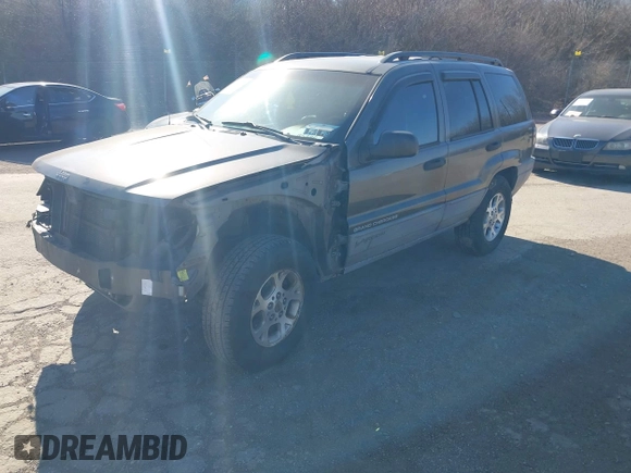 1999 Jeep Grand Cherokee Laredo with VIN 1J4GW58NXXC623753, listed as a IAAI auction lot 41685540 with 190,134 mi miles and . Bid and sale history available at DreamBid. Image 2.