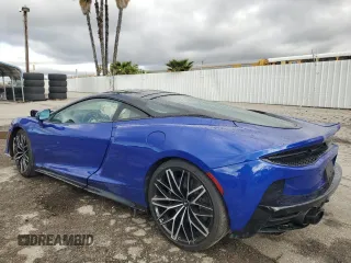 2023 McLaren GT z VIN SBM22GCA9PW003039, wystawiony jako Copart lot #47143765 z przebiegiem 2775 mil mil oraz Szkody całkowita. Historia ofert i sprzedaży dostępna na DreamBid. Obrazek 2.