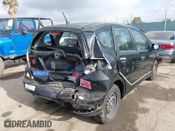 2010 Honda Fit with VIN JHMGE8H21AC039375, listed as a IAAI auction lot 42126138 with 123,077 mi miles. Bid and sale history available at carsss.com. Image 4.
