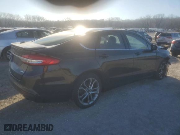 2017 Ford Fusion SE with VIN 3FA6P0HD9HR335451, listed as a Copart auction lot 42976645 with 174,969 mi miles and Salvage Title. Bid and sale history available at DreamBid. Image 4.