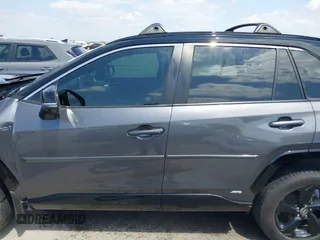 2021 Toyota RAV4 Hybrid XSE with VIN 2T3E6RFV8MW026973, listed as a IAAI auction lot 42052289 with 94,857 mi miles and . Bid and sale history available at DreamBid. Image 14.