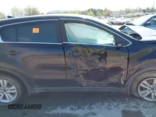 2019 Kia Sportage LX with VIN KNDPM3AC4K7621023, listed as a IAAI auction lot 41981361 with Not Provided miles and . Bid and sale history available at DreamBid. Image 13.