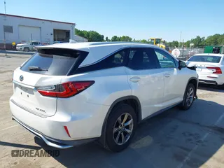 2018 Lexus RX 350L Premium z VIN JTJDZKCAXJ2006088, wystawiony jako IAAI lot #42332914 z przebiegiem 104 393 mil mil oraz . Historia ofert i sprzedaży dostępna na DreamBid. Obrazek 4.