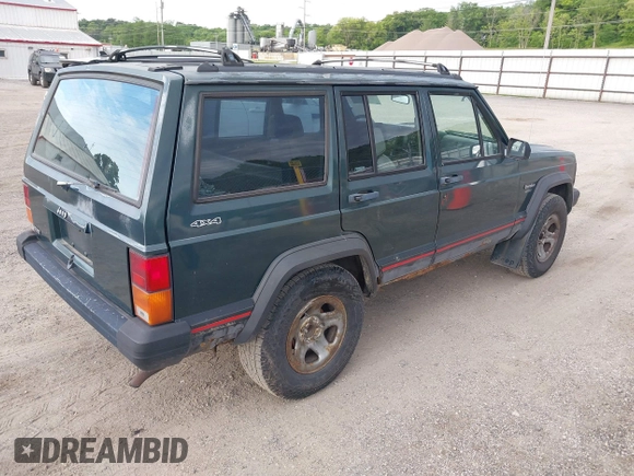 1993 Jeep Cherokee Sport with VIN 1J4FJ68S2PL622716, listed as a IAAI auction lot 42570145 with 183,159 mi miles and . Bid and sale history available at DreamBid. Image 4.