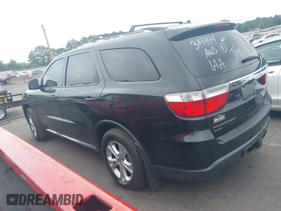 2012 Dodge Durango SXT with VIN 1C4RDJAG4CC314444, listed as a IAAI auction lot 42535630 with 205,494 mi miles and . Bid and sale history available at DreamBid. Image 14.